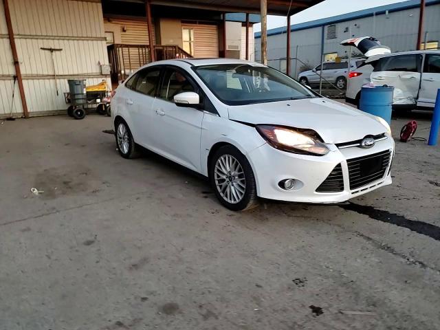 2013 Ford Focus Titanium VIN: 1FADP3J24DL330491 Lot: 80651964