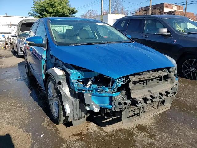 2017 Ford Focus Titanium VIN: 1FADP3J24HL207084 Lot: 79100304