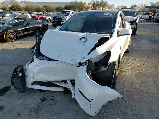 2023 Tesla Model Y VIN: 7SAYGDEE2PF644978 Lot: 82083404