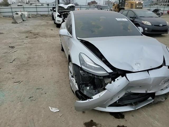 2018 Tesla Model 3 VIN: 5YJ3E1EA9JF060805 Lot: 82868714