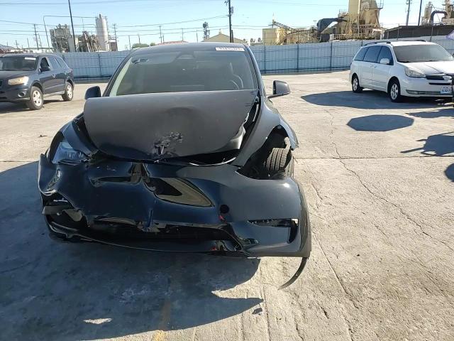 2023 Tesla Model Y VIN: 7SAYGDEF7PF888408 Lot: 93435325