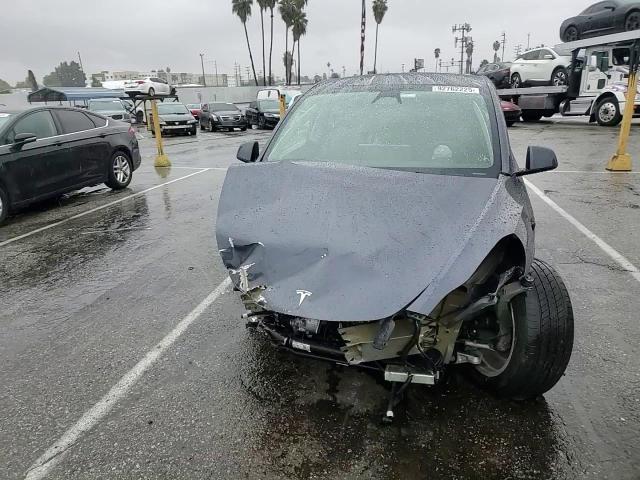2023 Tesla Model Y VIN: 7SAYGDEEXPF876888 Lot: 92762225