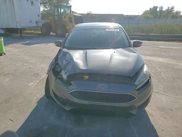 2017 Ford Focus Se VIN: 1FADP3F24HL216070 Lot: 94295085