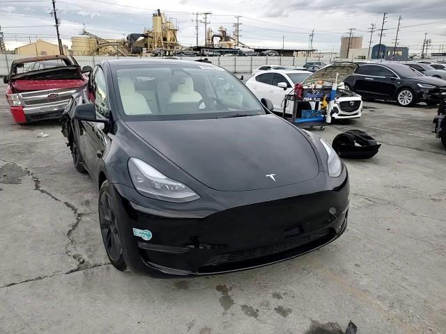2025 Tesla Model Y VIN: 7SAYGDEE8SF239703 Lot: 94100835
