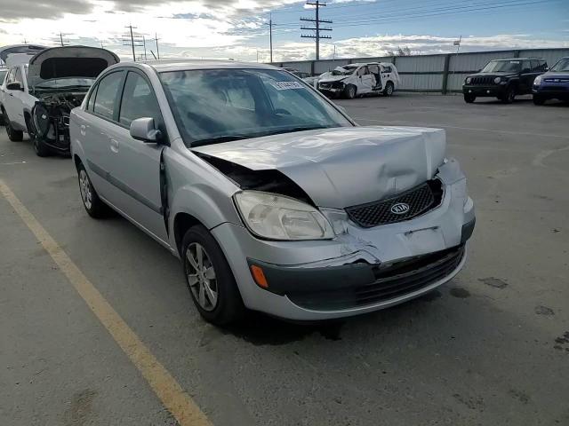 2009 Kia Rio Base VIN: KNADE223196578055 Lot: 91144795