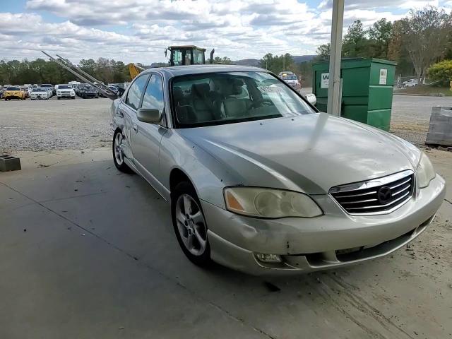 2001 Mazda Millenia VIN: JM1TA221611710365 Lot: 96911445