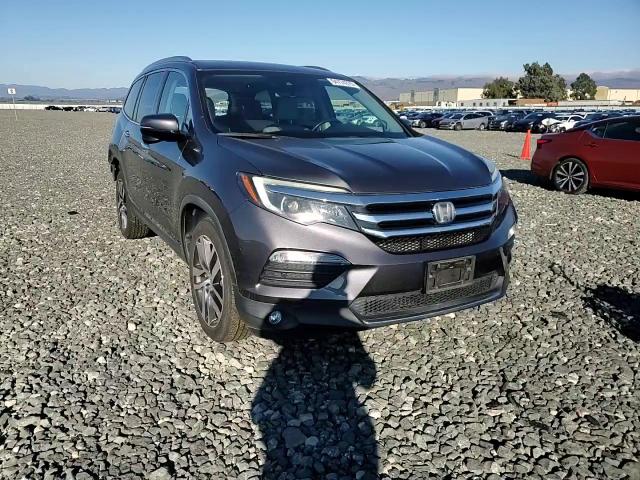 2018 Honda Pilot Touring VIN: 5FNYF5H98JB009193 Lot: 94774375