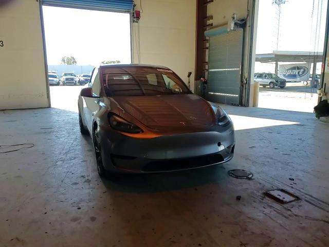 2025 Tesla Model Y VIN: 7SAYGDEEXSF296341 Lot: 91134115