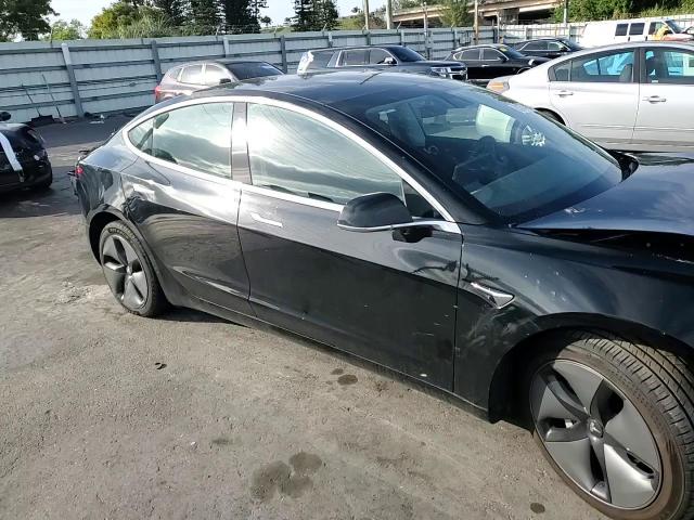 2019 Tesla Model 3 VIN: 5YJ3E1EA1KF306571 Lot: 91850485