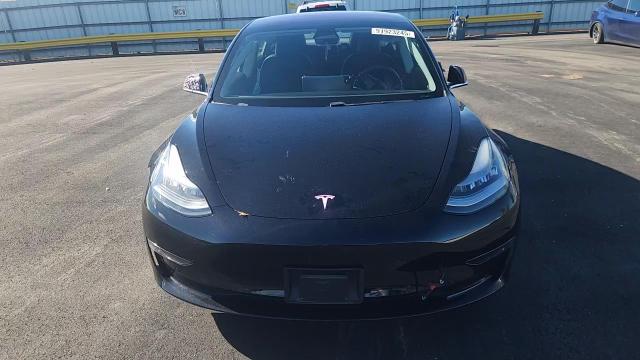 2018 Tesla Model 3 VIN: 5YJ3E1EA3JF010692 Lot: 91923245