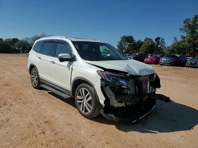 2017 Honda Pilot Touring VIN: 5FNYF5H97HB039487 Lot: 90976975