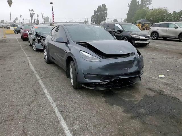 2023 Tesla Model Y VIN: 7SAYGDEE1PA189120 Lot: 90830525
