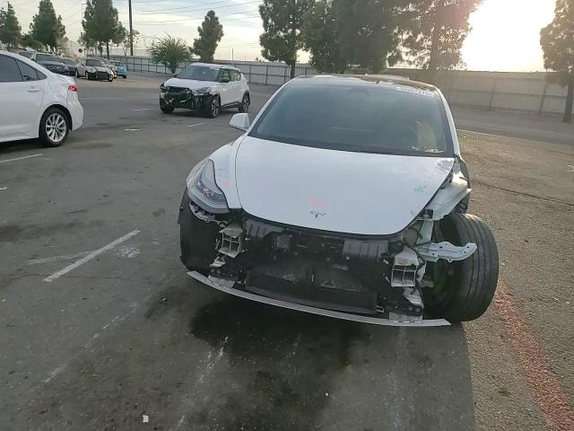 2019 Tesla Model 3 VIN: 5YJ3E1EAXKF434534 Lot: 90867315