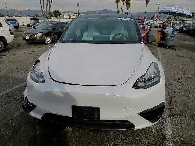 2023 Tesla Model Y VIN: 7SAYGDEEXPF605779 Lot: 92246965