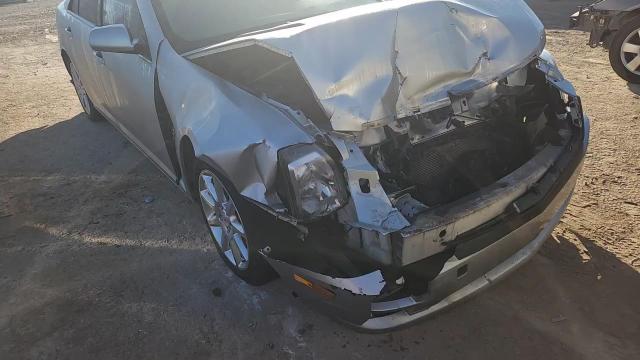 2007 Cadillac Sts VIN: 1G6DC67A770125679 Lot: 92854755