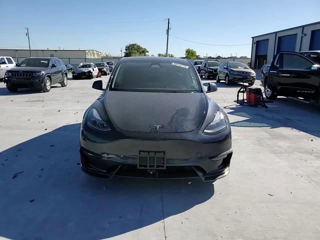 2024 Tesla Model Y VIN: 7SAYGDEEXRA242562 Lot: 90516775
