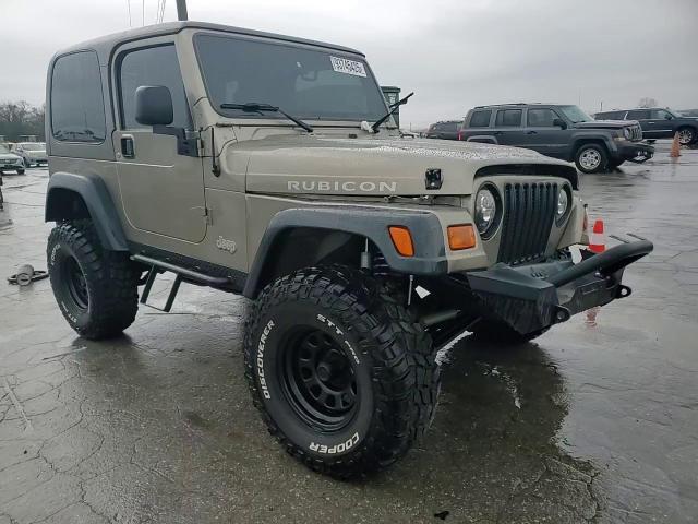 2004 Jeep Wrangler / Tj Rubicon VIN: 1J4FA69S04P779745 Lot: 93745425