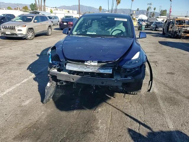 2024 Tesla Model Y VIN: 7SAYGDEEXRF003676 Lot: 94365555