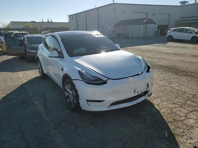 2023 Tesla Model Y VIN: 7SAYGDEE2PA102020 Lot: 94173075