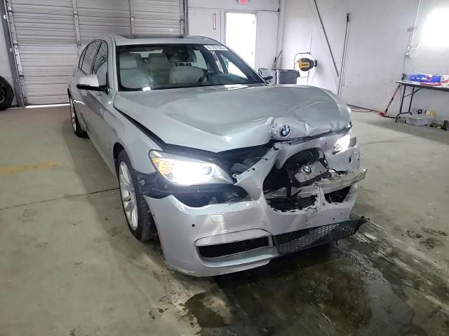 2014 BMW 740 Li VIN: WBAYE4C57ED138733 Lot: 91781635