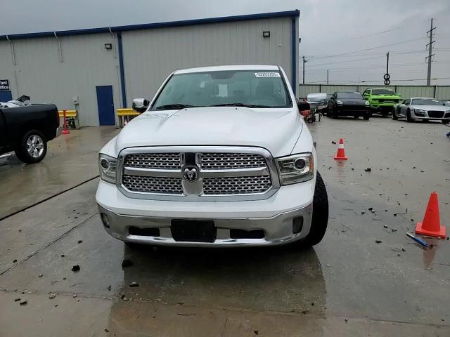 2015 Ram 1500 Laramie VIN: 1C6RR6NMXFS589980 Lot: 93203205