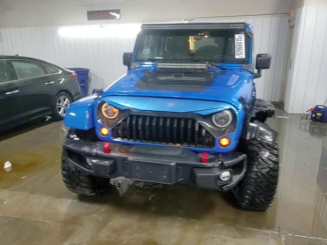 2014 Jeep Wrangler Unlimited Sahara VIN: 1C4HJWEG9EL265563 Lot: 93968415
