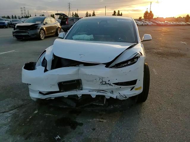 2021 Tesla Model 3 VIN: 5YJ3E1EA7MF059009 Lot: 93510975