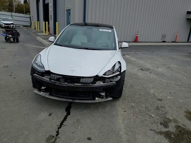 2021 Tesla Model 3 VIN: 5YJ3E1EB9MF863191 Lot: 94312155