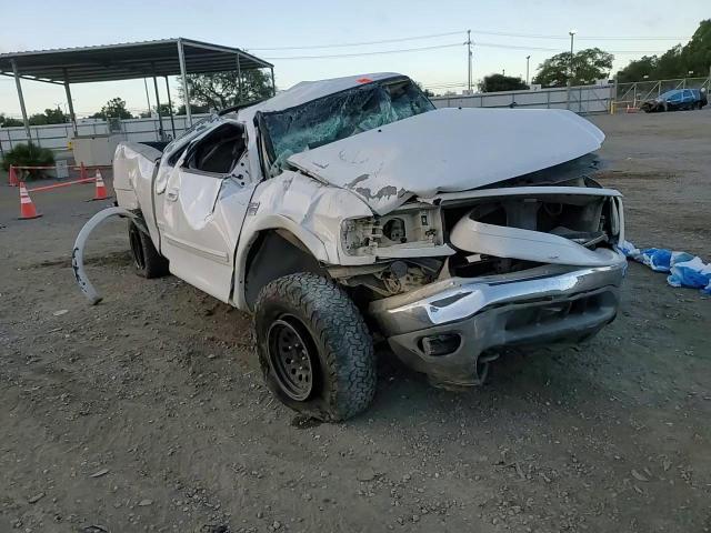 2000 Ford F150 VIN: 1FTRX18L3YKA63763 Lot: 91619515