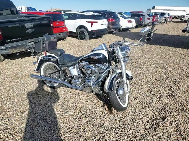 2012 Harley-Davidson Flstn Softail Deluxe VIN: 1HD1JDV10CB025773 Lot: 94646735