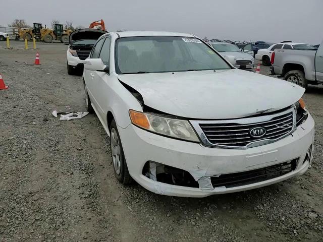 2009 Kia Optima Lx VIN: KNAGE228X95304352 Lot: 93837405