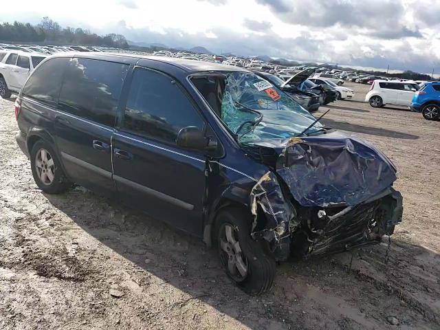 2005 Dodge Caravan Sxt VIN: 1D4GP45R05B323679 Lot: 94542935