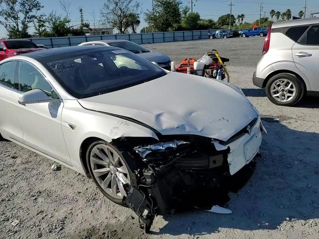 2016 Tesla Model S VIN: 5YJSA1E22GF141783 Lot: 92808305