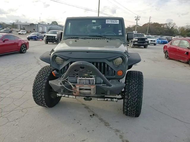 2007 Jeep Wrangler Sahara VIN: 1J4FA54127L153246 Lot: 91785035