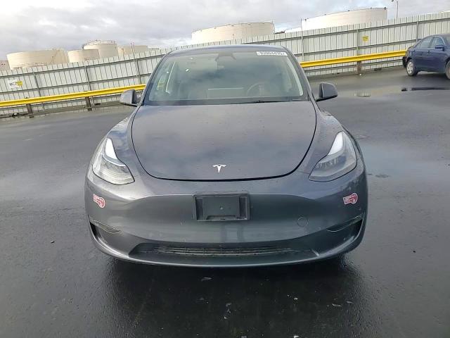 2023 Tesla Model Y VIN: 7SAYGDED4PF976573 Lot: 93004435
