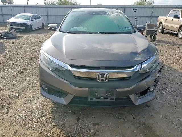2018 Honda Civic Touring VIN: JHMFC1F99JX023037 Lot: 93339175