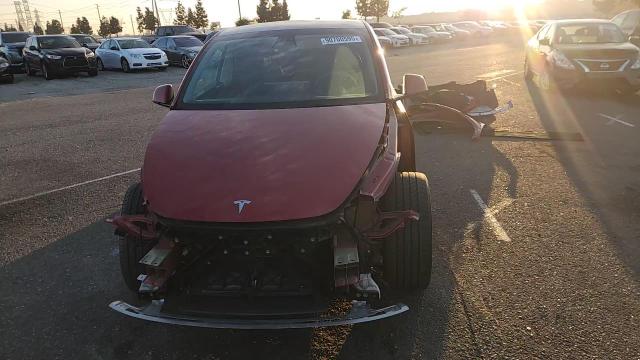 2023 Tesla Model Y VIN: 7SAYGDEE4PF597596 Lot: 90700595