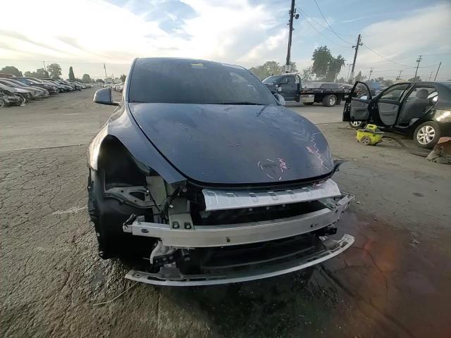 2022 Tesla Model Y VIN: 7SAYGDEF6NF487557 Lot: 91831595
