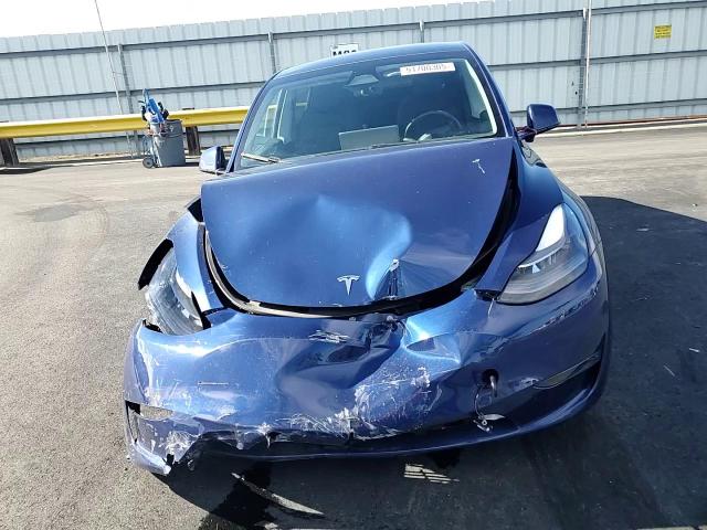 2023 Tesla Model Y VIN: 7SAYGDEE2PF972238 Lot: 91700305