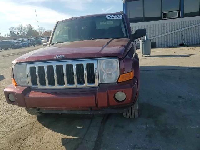 2007 Jeep Commander VIN: 1J8HG48K97C668974 Lot: 92597005