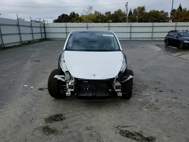2023 Tesla Model Y VIN: 7SAYGDEEXPF741054 Lot: 89909765