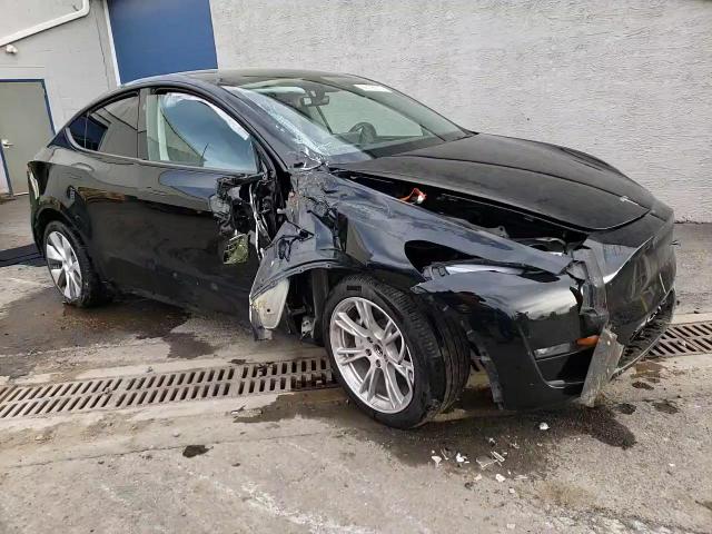 2023 Tesla Model Y VIN: 7SAYGDEE1PA184502 Lot: 92728975