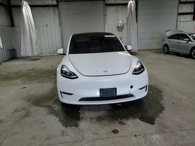 2023 Tesla Model Y VIN: 7SAYGDEF5PF776061 Lot: 91374555