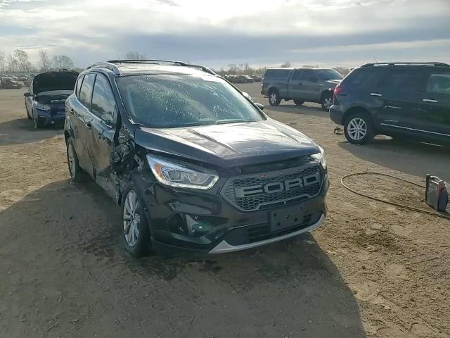 2017 Ford Escape Titanium VIN: 1FMCU0J98HUF03242 Lot: 91346905