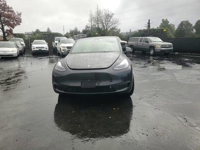 2025 Tesla Model Y VIN: 7SAYGAEE1SF232171 Lot: 92808765