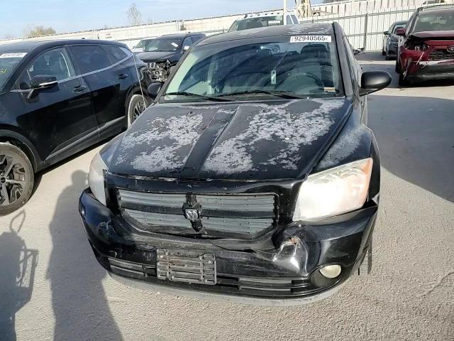 2007 Dodge Caliber Sxt VIN: 1B3HB48B97D320562 Lot: 92940565