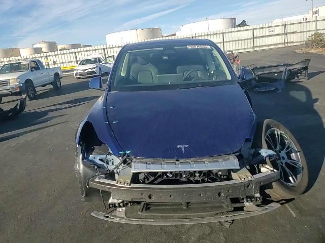 2025 Tesla Model Y VIN: 7SAYGDED3SF230687 Lot: 90876065