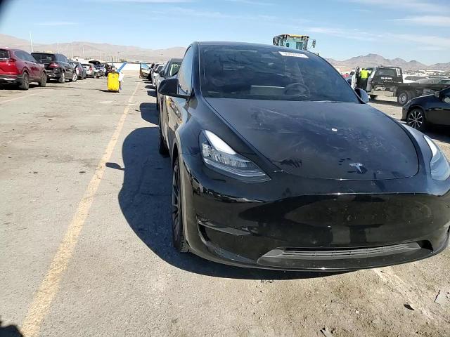 2023 Tesla Model Y VIN: 7SAYGDEE9PA028157 Lot: 90890305
