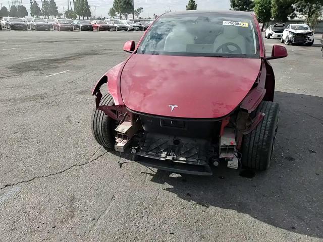 2023 Tesla Model Y VIN: 7SAYGDEE0PF623322 Lot: 92566845