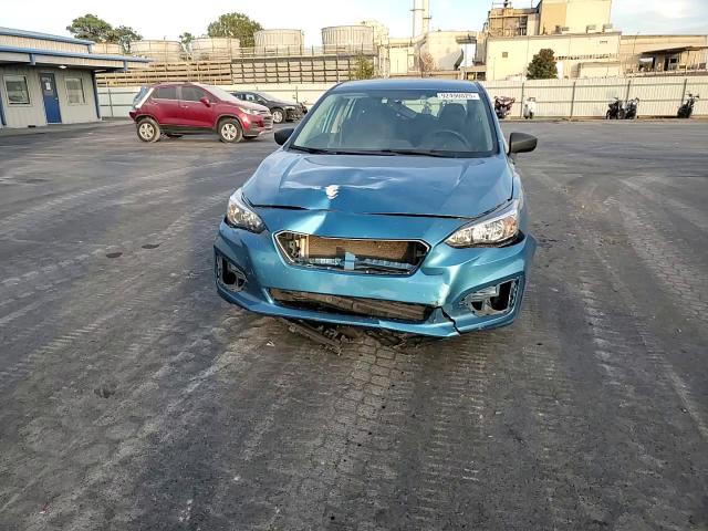 2018 Subaru Impreza VIN: 4S3GTAA69J1745694 Lot: 92490025